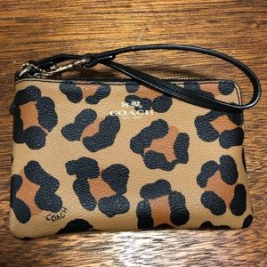 Coach ocelot wristlet